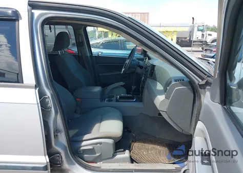 2007 Jeep Grand Cherokee Laredo из США, поврежденный, VIN 1J8GR48K07C667489